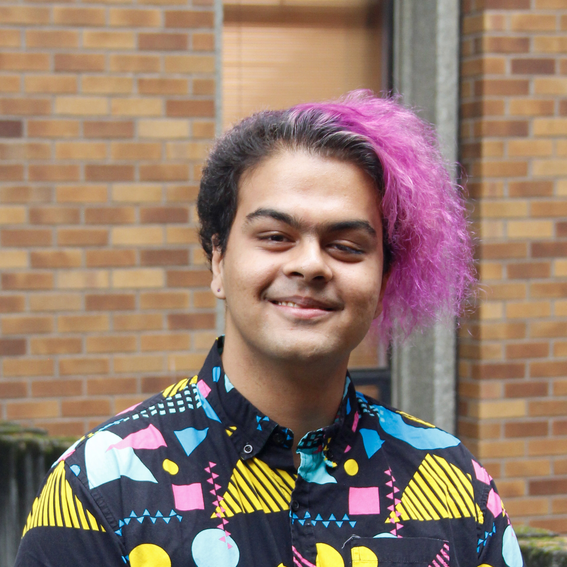 Headshot of Zawad: One person standing in front of blurred background